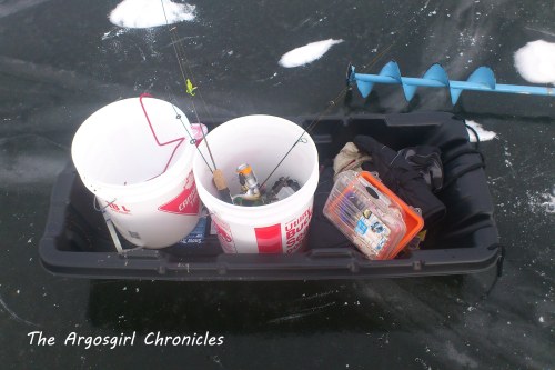 Going light (for us). Just the sled, some buckets, a few rods, and the fish finders (sitting at holes when I took this pic).
